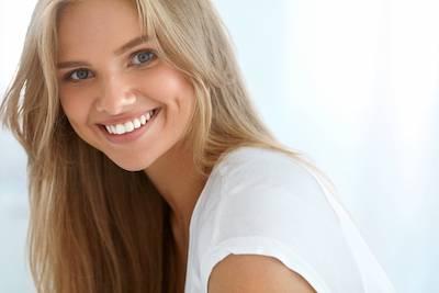 A lady with dental restorations in Hermitage, PA