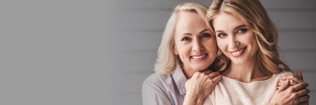 Friends laughing after cosmetic dentistry at Thomas Family Dentistry